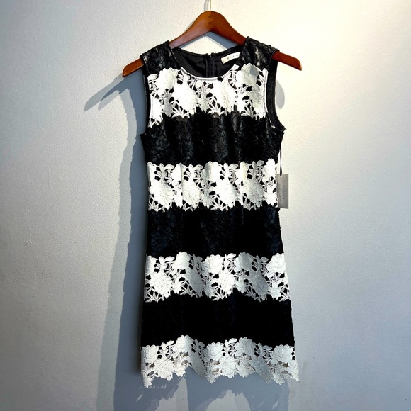 Dresses & Skirts - NWT**Stunning Floral Black/White Leather Dress**$750